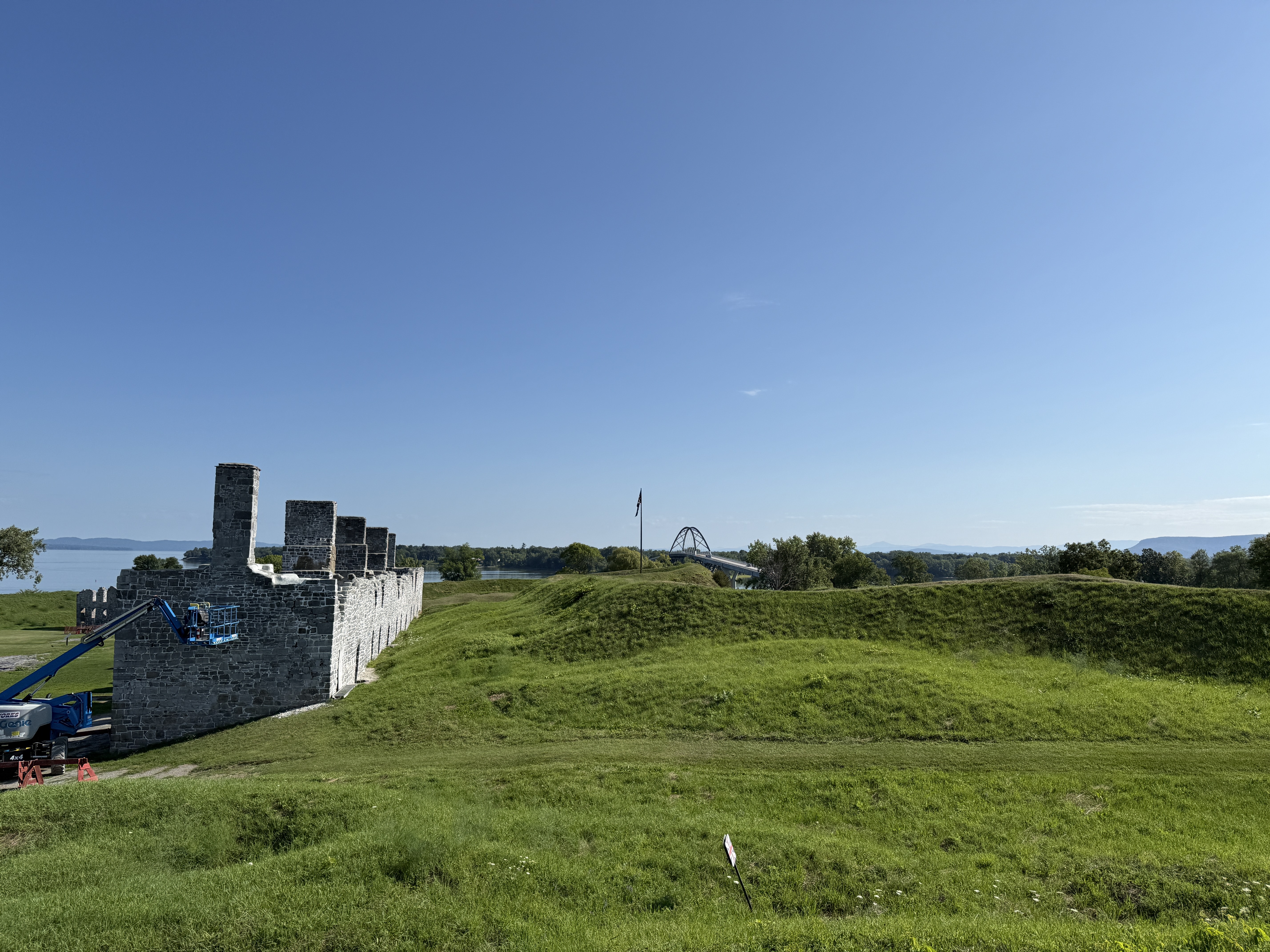 Fort with parapets and reinforcement with the Lake Champlain Bridge in the background