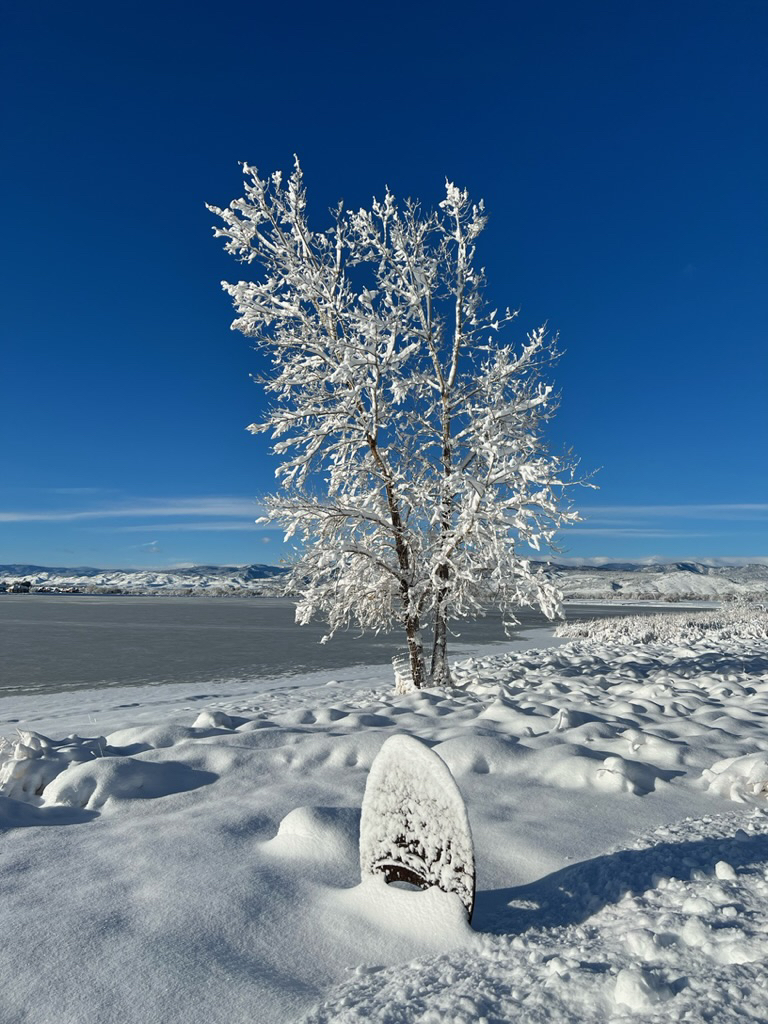 Mile marker under the deep blue sky