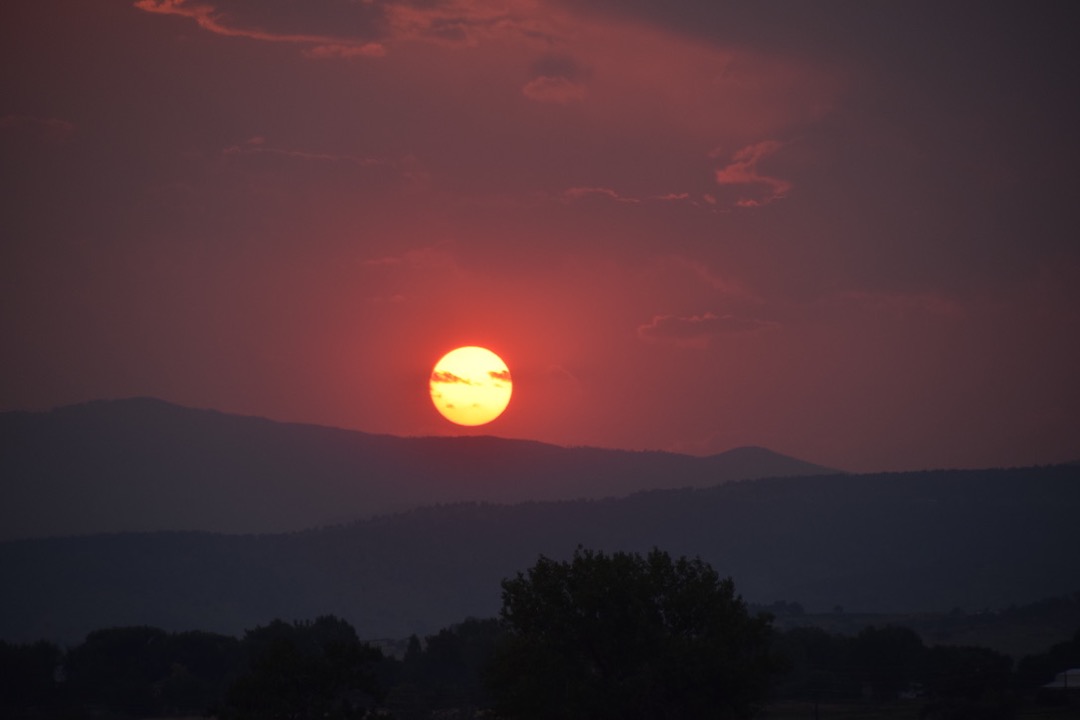 Setting sun in wildfire smoke