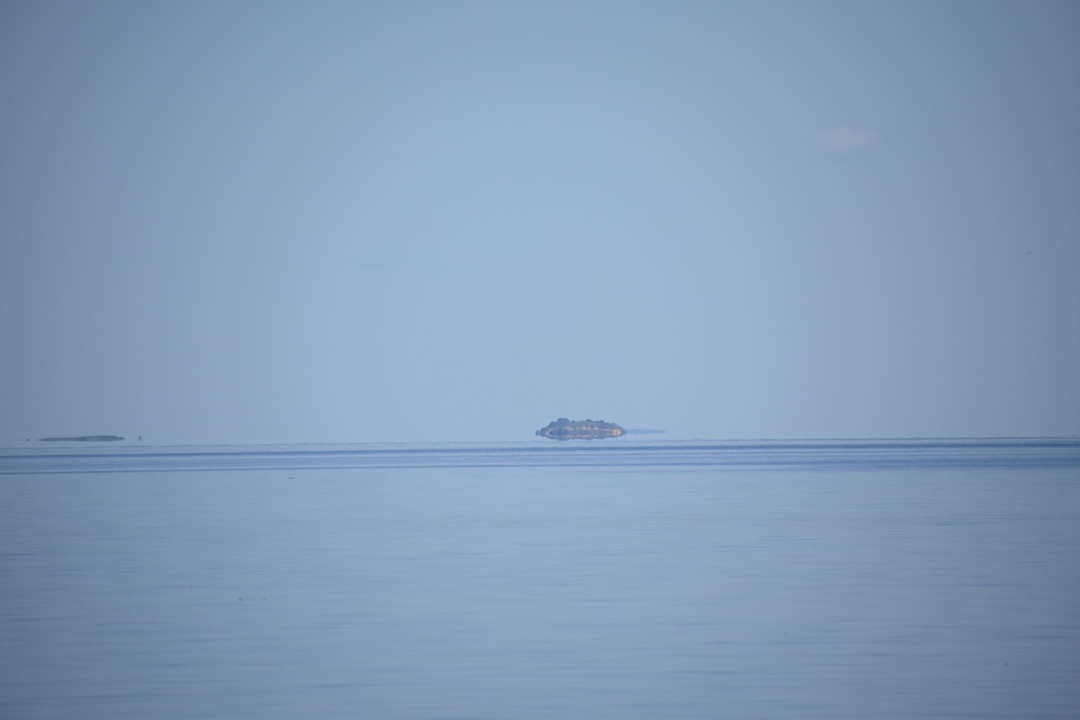Islands appear to be hovering on the lake